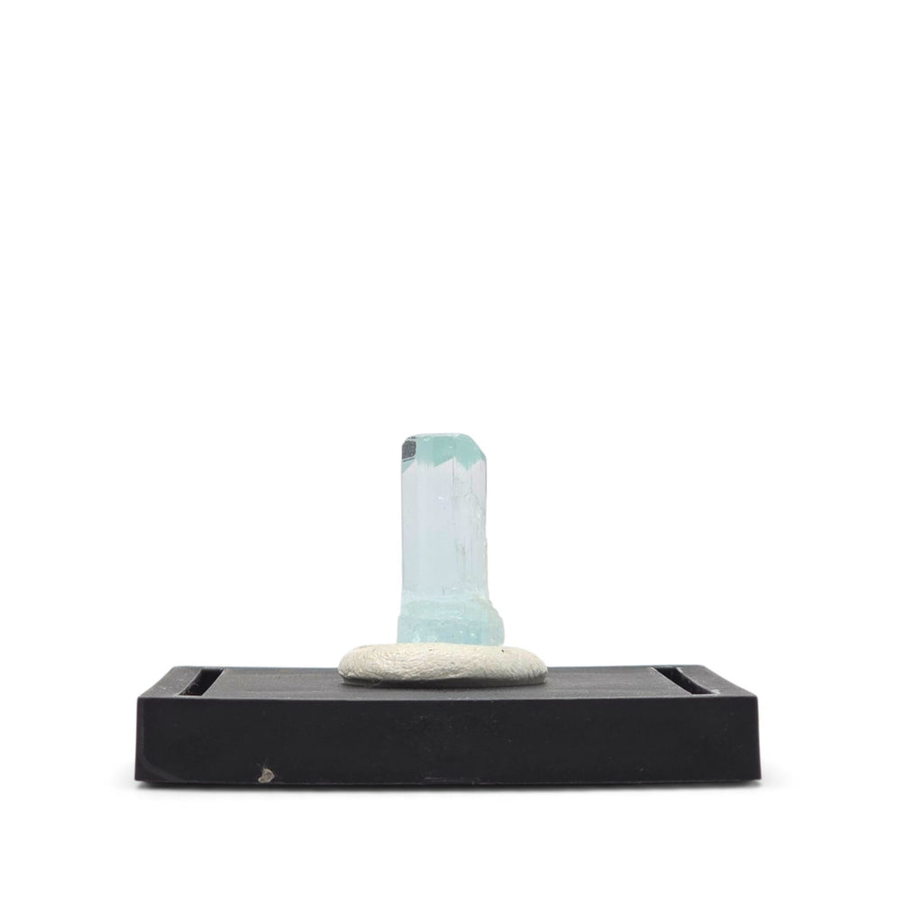 Rear view of the pale blue aquamarine crystal with a stronger blue lower growth zone