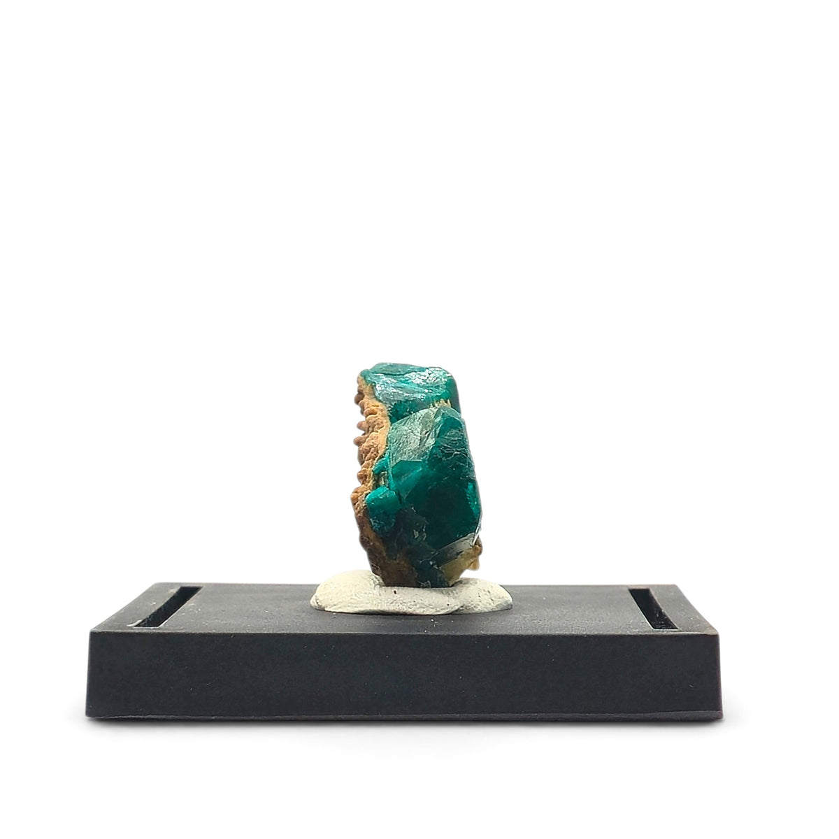 Side view showing the thick blue-green dioptase crystals and narrow brown matrix edge